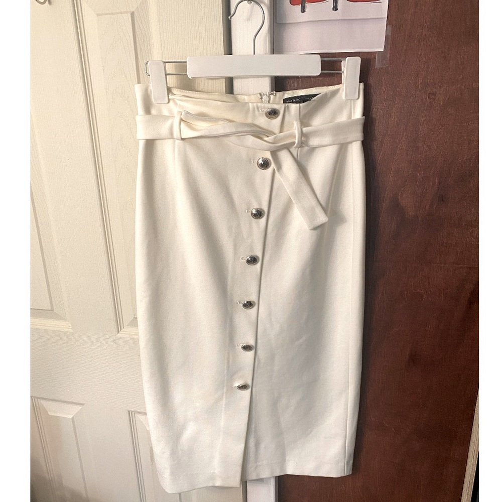 White black market  highly waist skirt  
Waist 35in
Long 71inch